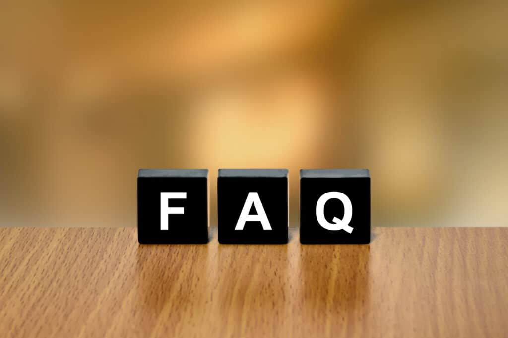 FAQs presented on a black block with a blurred background, FAQs about Bathroom Remodeling by Mana Home Services.